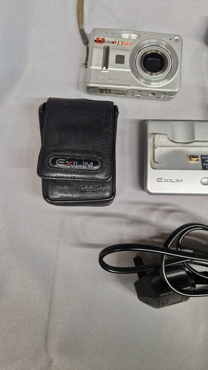 CASIO EXILIM EX-Z57 5.0MP SILVER DIGITAL CAMERA WITH CHARGING DOCKING STATION (used)